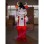 Convivial Cow With Red Rompers Mascot Costume