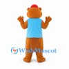 Bear Mascot Costume in Tan with Blue Vest and Red Cap