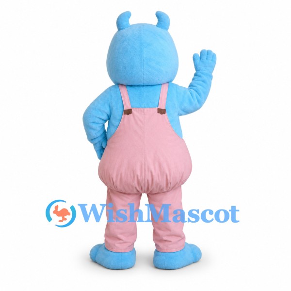 Blue Monster Mascot Costume with Pink Overalls and Curled Horns