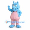 Blue Monster Mascot Costume with Pink Overalls and Curled Horns