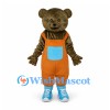 Bear Mascot Costume in Brown with Orange Overalls and Blue Shoes