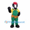 Builder Badger Mascot Costume with Green Overalls and Red Cap