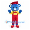 Bear Mascot Costume in Blue with Red Graduation Cap and Overalls
