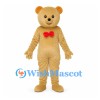 Bear Mascot Costume in Gold with Red Bow Tie