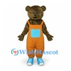 Bear Mascot Costume with Orange Overalls and Turquoise Pocket