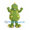 Dinosaur Mascot Costume in Green with Yellow Spots and White Fangs