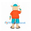 Cow Mascot Costume in Orange Shirt with Teal Cap and Shorts