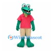 Crocodile Mascot Costume in Green with Pink Polo Shirt and Beige Shorts