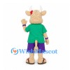 Cow Mascot Costume in Green Shirt with Purple Shorts and Red Hair Bows