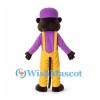 Otter Mascot Costume with Purple Cap Shirt and Yellow Suspender Pants