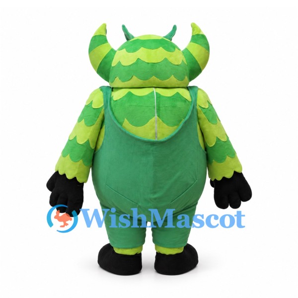 Green Monster Mascot Costume with Striped Horns and Overalls