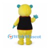 Bear Mascot Costume in Yellow with Teal Ears and Black Vest