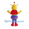 Alien Mascot Costume with Yellow Head Purple Pants and Red Cape