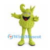 Green Monster Mascot Costume with Curled Horns and Textured Body